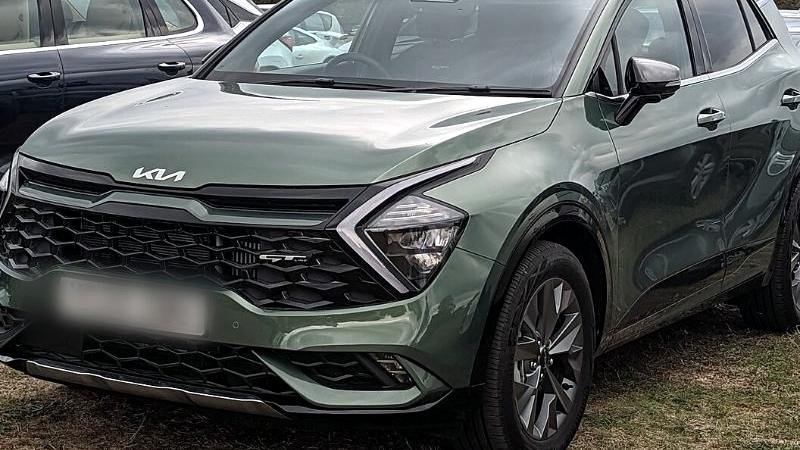 Stock photograph of a compact SUV on a forecourt