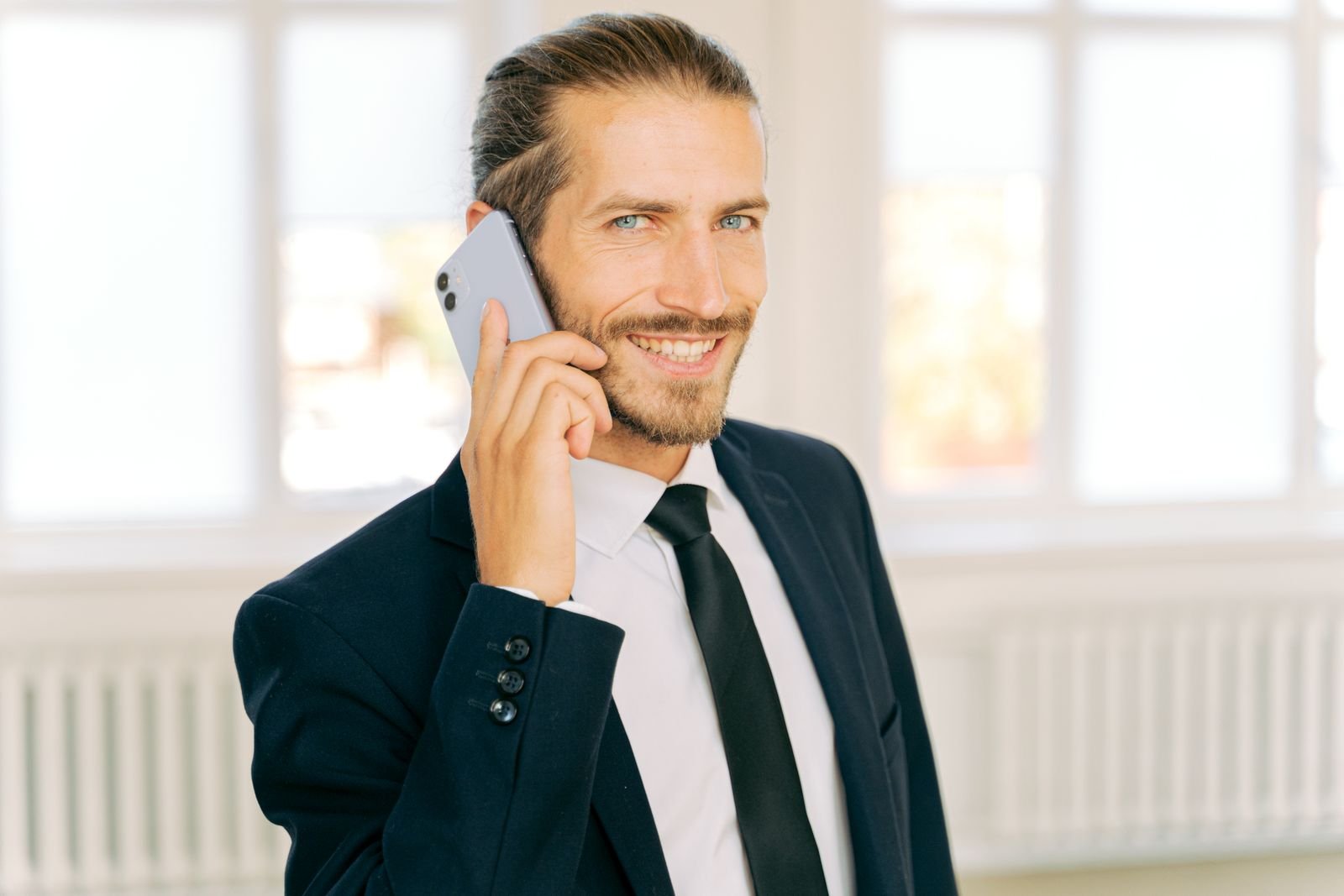 A business owner answering a customer call